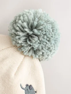 Naturel geborduurd met safariprint - Beanie-muts met pompon (3mnd-10jr)