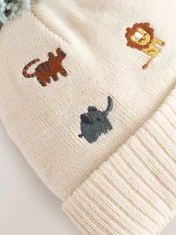 Naturel geborduurd met safariprint - Beanie-muts met pompon (3mnd-10jr)