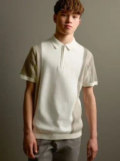 Neutraal met kleurvlakken - Gebreid poloshirt met rits bij de hals (3-16jr)