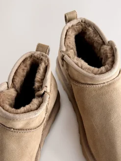 Neutraal taupe suède - Waterafstotende enkellaarzen van imitatiebont
