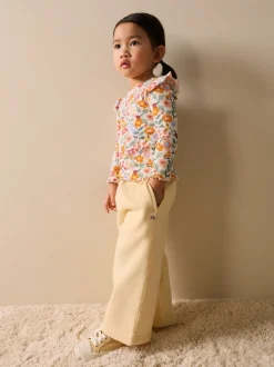 Oranje fijn gebloemd - Long Sleeve Ribbed Frill Top (3mths-7yrs)