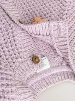 Paarse en abrikozenkleurige bloemen voor baby's - Geborduurd vest (0 mnd - 2 jr)