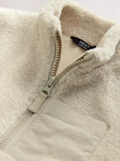 Pastelgeel - Effen fleece met rits en trechterhals (3mnd-7jr)