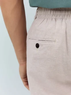 Pastelgeel - Korte chino met elastische taille met hoog linnenpercentage