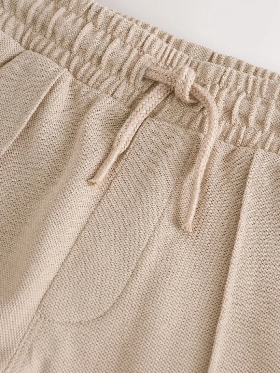 Pastelgeel - Pintuck joggingbroek van 100% katoen (3mnds-7jr)