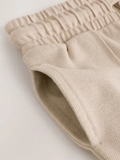 Pastelgeel - Pintuck joggingbroek van 100% katoen (3mnds-7jr)