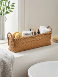 Plastic gevlochten opslagmand