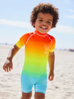 Regenboog dip-dye - Zonbeschermend onesie (3 mnd-7 jr)