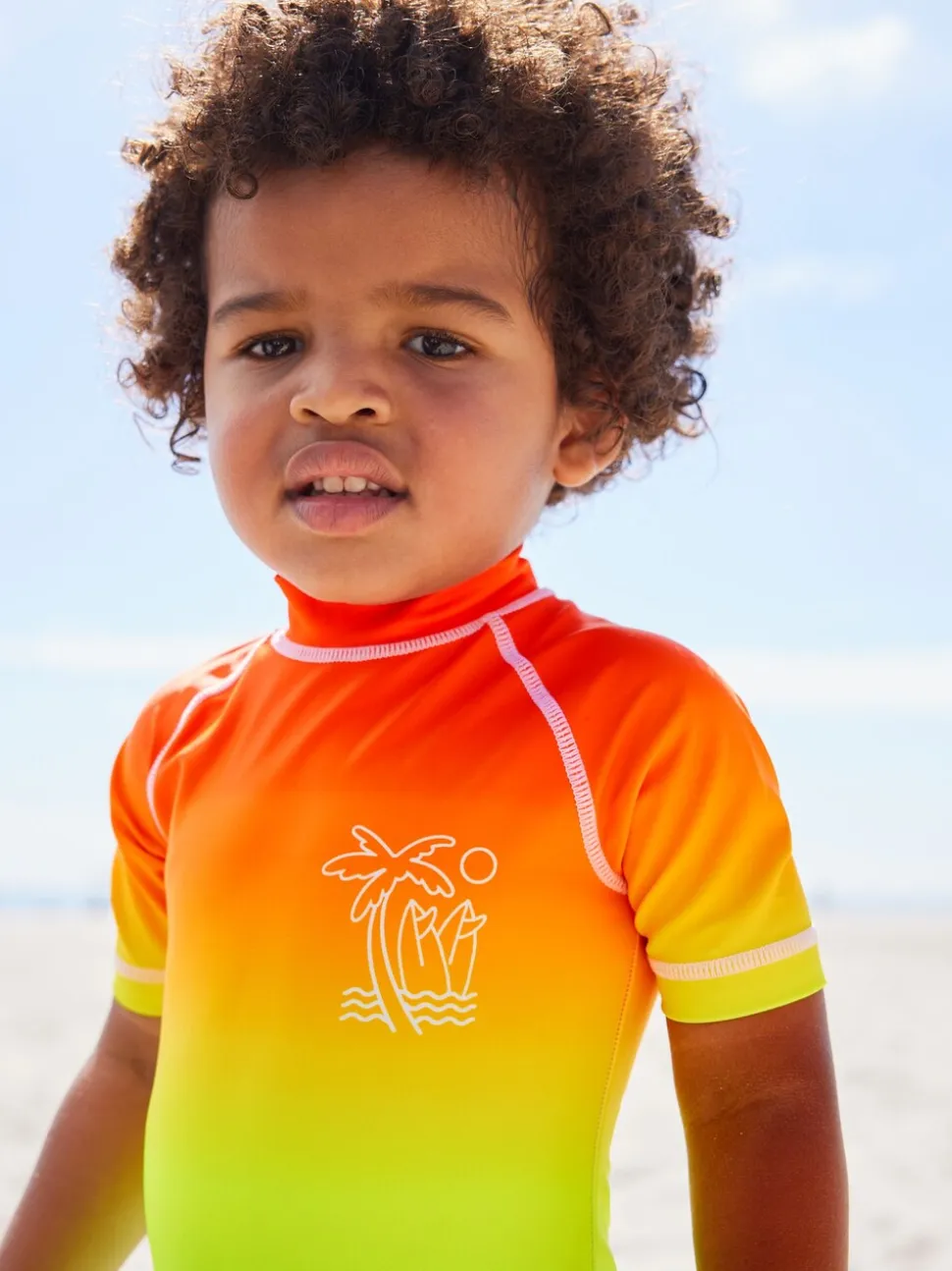 Regenboog dip-dye - Zonbeschermend onesie (3 mnd-7 jr)