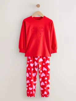 Rode strikken/hartjes - Verpakking van 3 pyjama's met joggingbroek (3-16 jr)