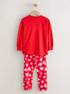 Rode strikken/hartjes - Verpakking van 3 pyjama's met joggingbroek (3-16 jr)