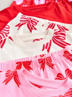 Rode strikken/hartjes - Verpakking van 3 pyjama's met joggingbroek (3-16 jr)
