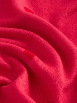 Rood met sterren - Zachte pyjama met lange mouwen en hartjesprint