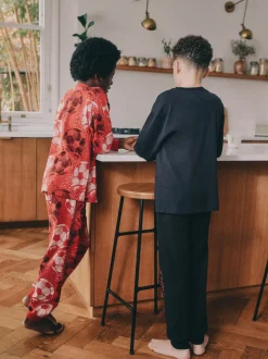 Rood/zwart voetbal  - Verpakking van 2 pyjama's met lange mouwen (3-16 jr)