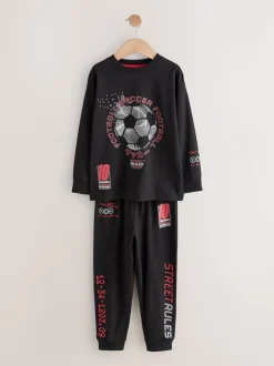 Rood/zwart voetbal  - Verpakking van 2 pyjama's met lange mouwen (3-16 jr)