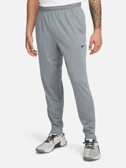 Rookgrijs - Nike Dri-FIT Totality trainingsbroek met taps toelopende pijpen