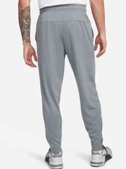 Rookgrijs - Nike Dri-FIT Totality trainingsbroek met taps toelopende pijpen