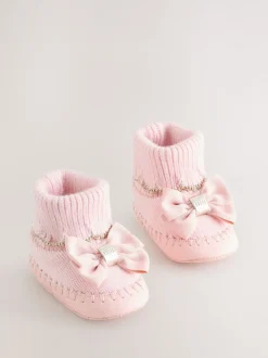 Roze - Gebreide padderslaarsjes met geschulpte rand voor babymeisjes met strik