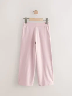 Roze - Jersey broek met wijde pijpen (3-16 jr)