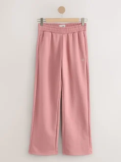 Roze - self. joggingbroek met wijde pijpen