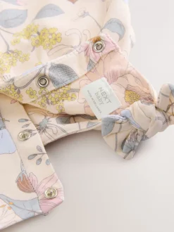Roze bloemen - Babyromper met lange pijpen (0 mnd - 3 jr)