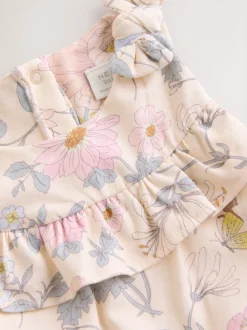 Roze bloemen - Babyromper met lange pijpen (0 mnd - 3 jr)