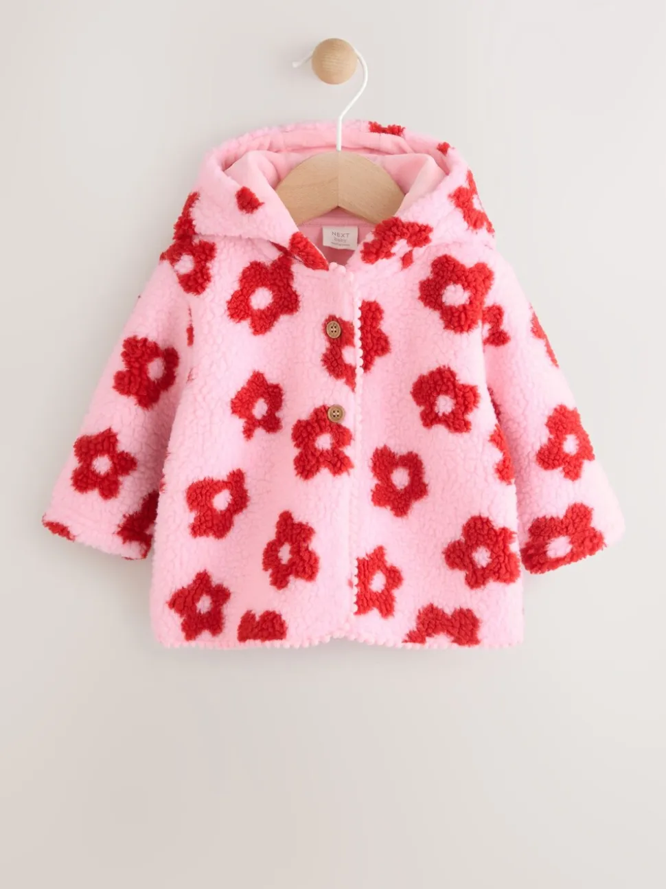 Roze bloemenprint over het geheel - Borg babyjack met capuchon (0mnd-2jr)