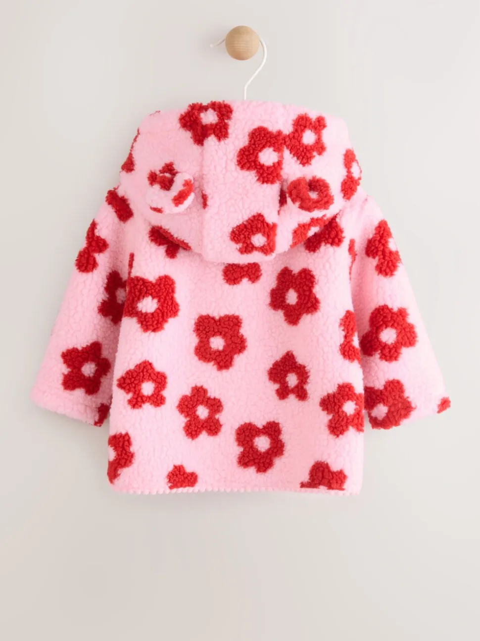 Roze bloemenprint over het geheel - Borg babyjack met capuchon (0mnd-2jr)
