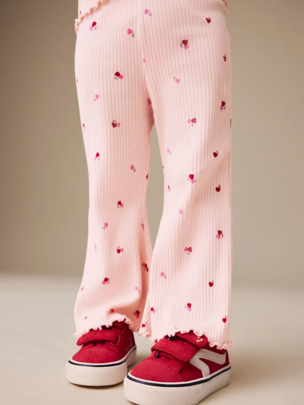 Roze kersenharten - Geribbelde flare legging (3 mnd-7 jr)