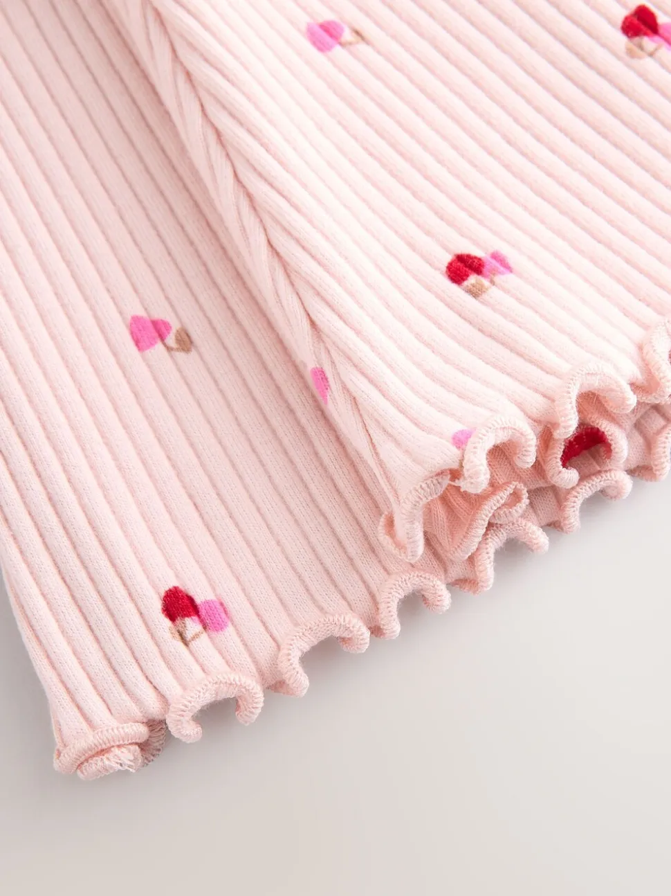 Roze kersenharten - Geribbelde flare legging (3 mnd-7 jr)