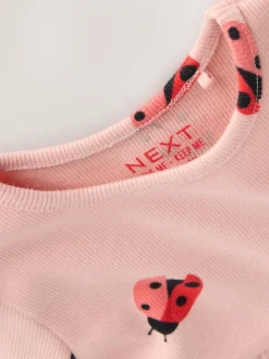 Roze lieveheersbeestje - Geribbelde jurk met lange mouwen (3mnd-7jr)