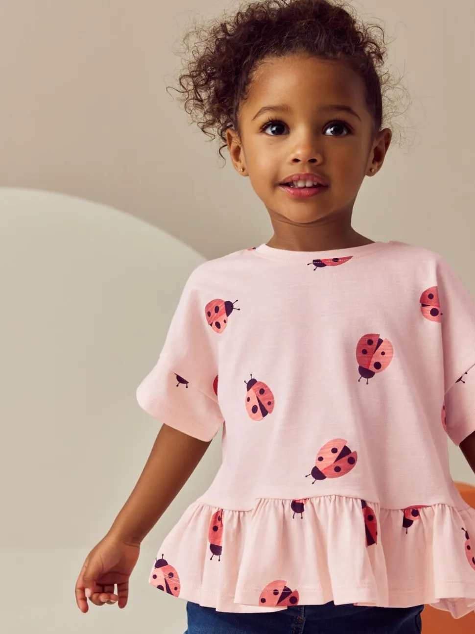 Roze lieveheersbeestje - T-shirt met peplum en korte mouwen (3mnd -7jr)