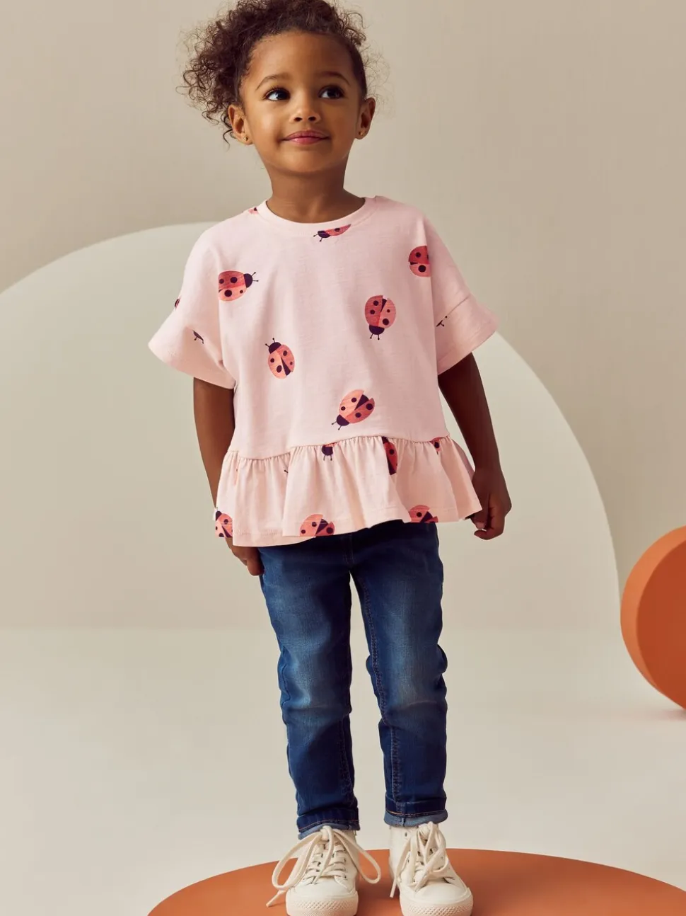 Roze lieveheersbeestje - T-shirt met peplum en korte mouwen (3mnd -7jr)