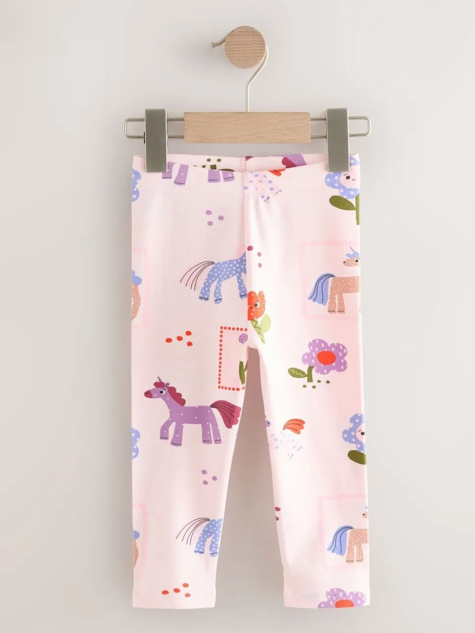 Roze met eenhoornprint - Verpakking van 3 leggings (3 mnd-7 jr)