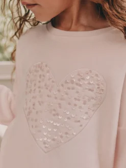 Roze met hart van lovertjes - Behaaglijke fleece pyjama (9 mnd-16 jr)