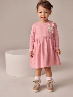 Roze met konijnen - Jurk met lange mouwen en versiering (3mnd -7jr)