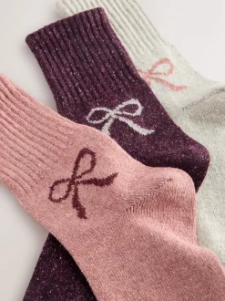 Roze met strikjes - Thermische enkelsokken van wol-zijdemix verpakking van 3
