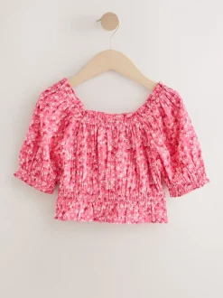 Roze met vrolijke print - Gesmokte blouse (3-16jr)