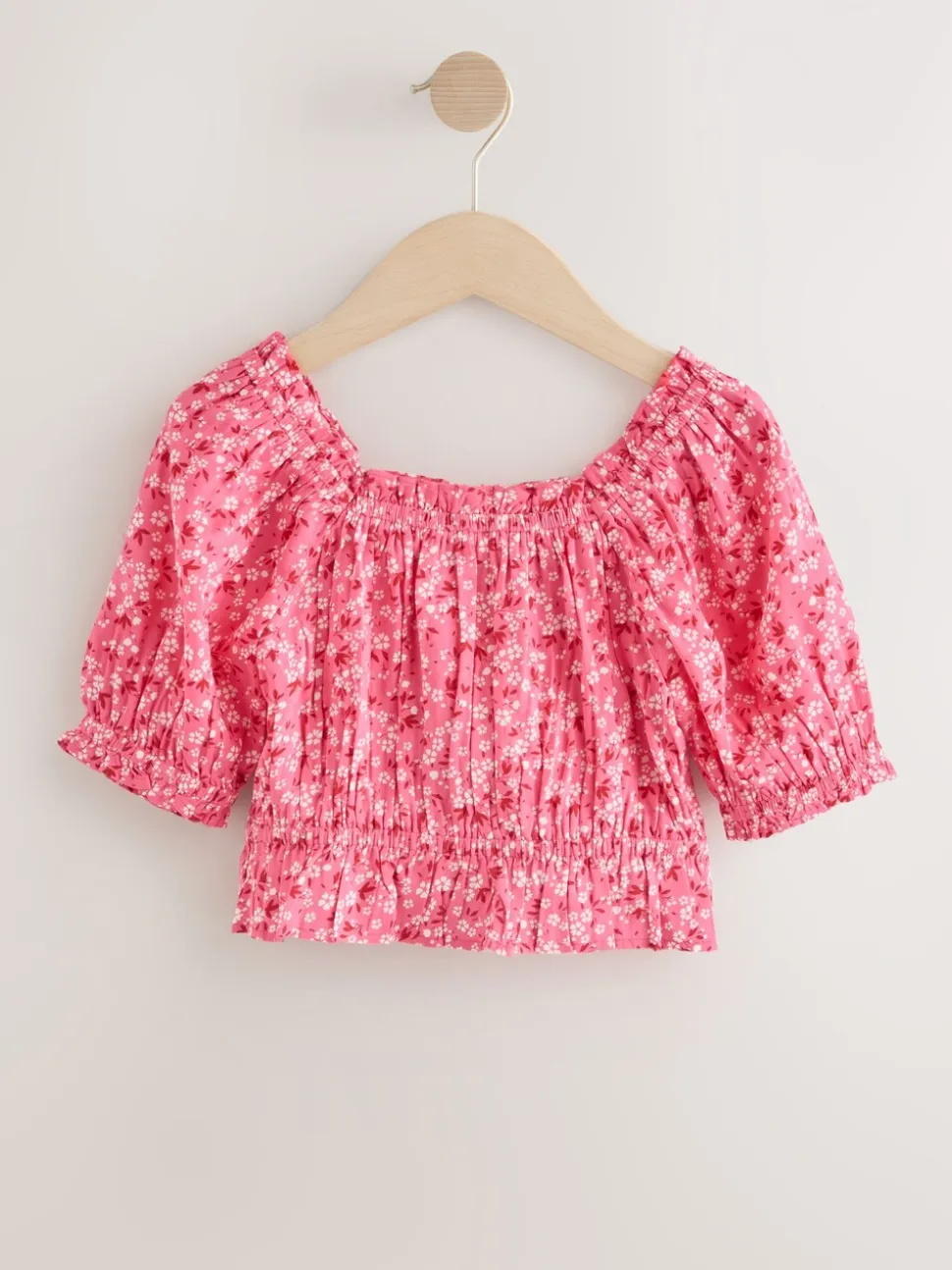 Roze met vrolijke print - Gesmokte blouse (3-16jr)