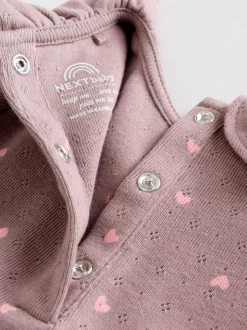 Roze/crème/bruin met fijne bloemetjesprint - Verpakking van 4 babyrompers met lange mouwen en ruches (0mnd-2jr)