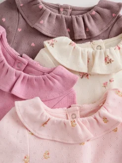 Roze/crème/bruin met fijne bloemetjesprint - Verpakking van 4 babyrompers met lange mouwen en ruches (0mnd-2jr)