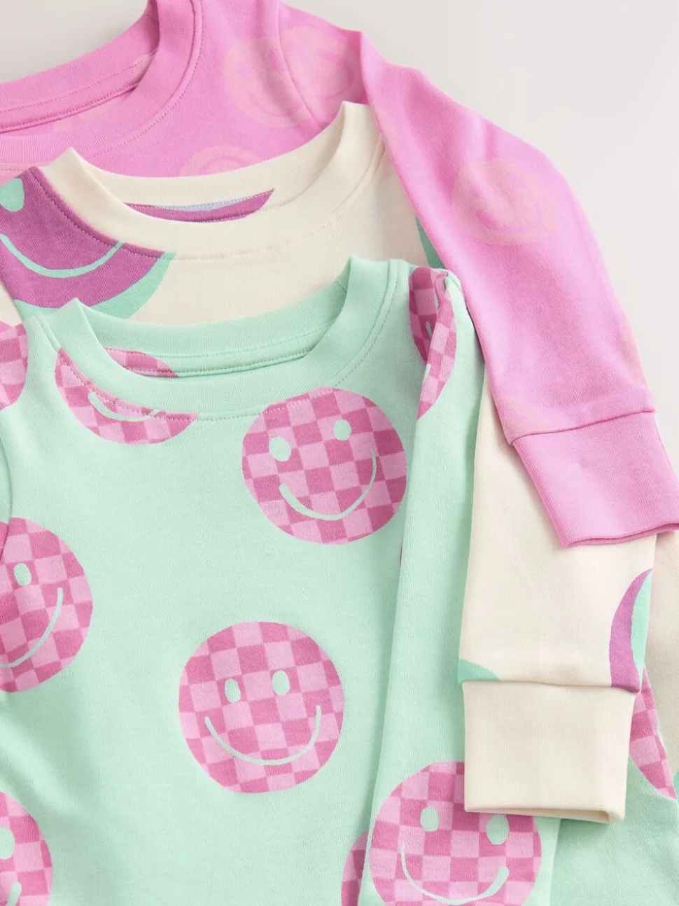 Roze/Groene glimlach - Verpakking van 3 knusse pyjama's (9 mnd-12 jr)
