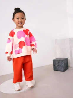 Roze/rood met hart - Set van sweatshirt en joggingbroek met rechte wijde pijpen (3mnd -7jr)