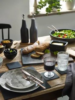 Set van 4 omkeerbare placemats en onderzetters van imitatieleer