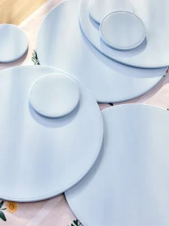 Set van 4 omkeerbare placemats en onderzetters van imitatieleer