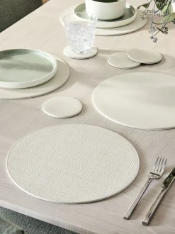 Set van 4 omkeerbare placemats en onderzetters van imitatieleer