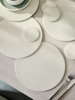 Set van 4 omkeerbare placemats en onderzetters van imitatieleer
