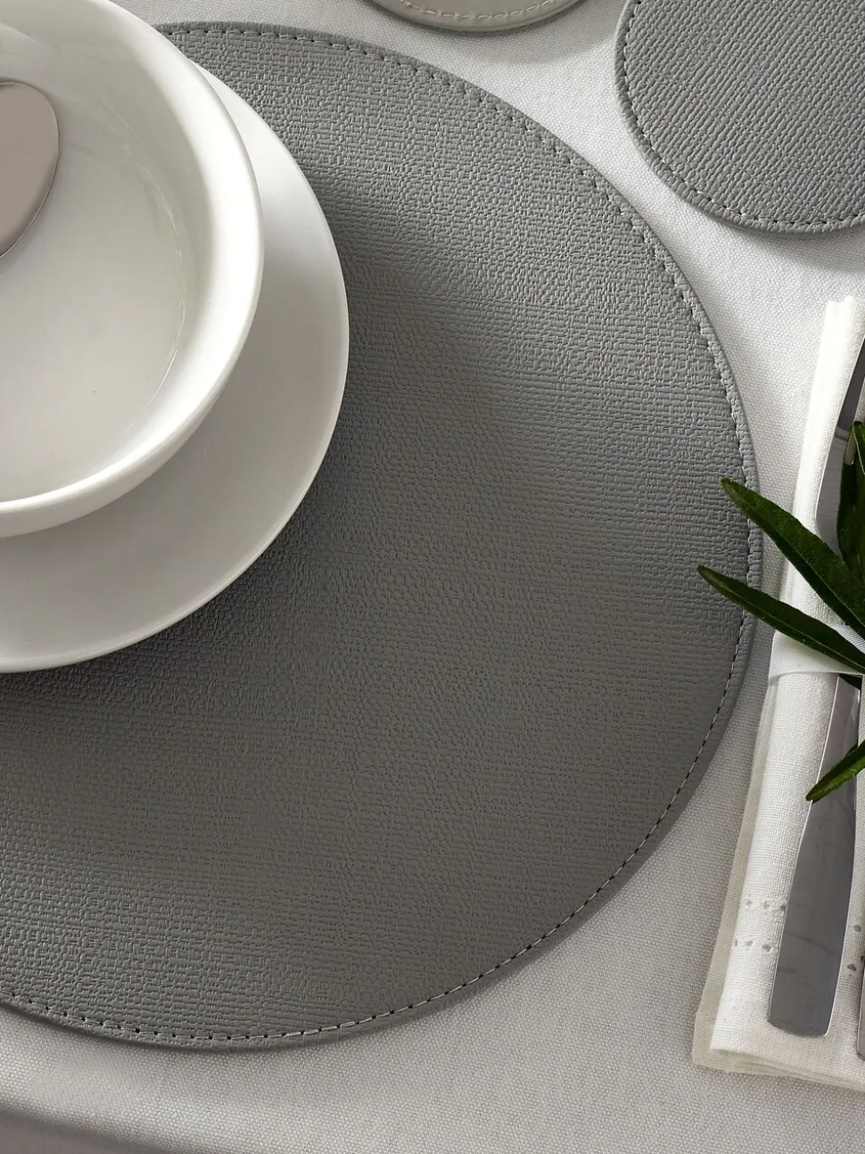 Set van 4 omkeerbare placemats en onderzetters van imitatieleer