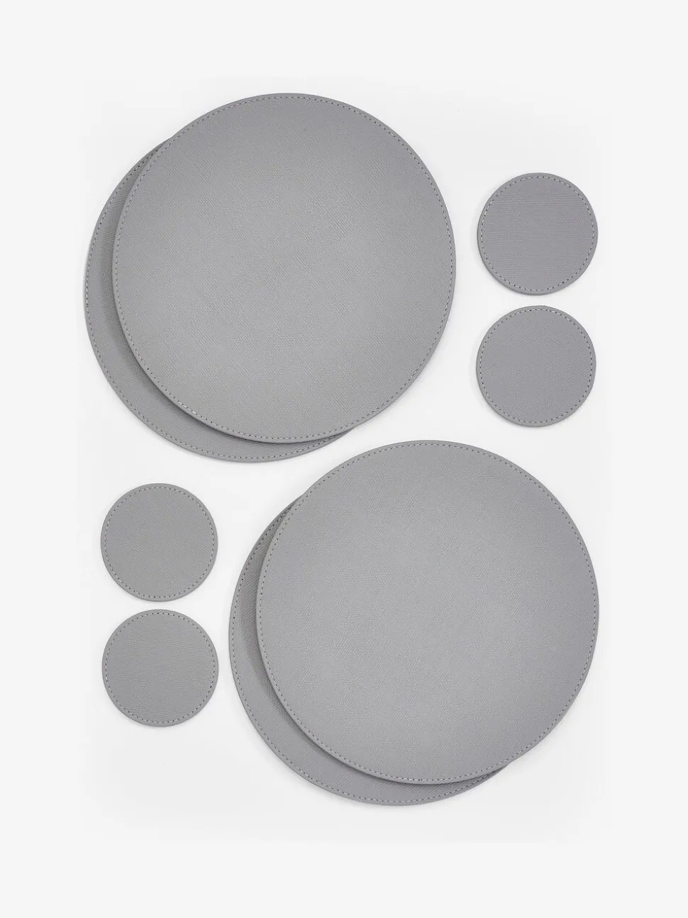 Set van 4 omkeerbare placemats en onderzetters van imitatieleer