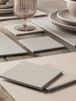 Set van 4 omkeerbare placemats en onderzetters van imitatieleer